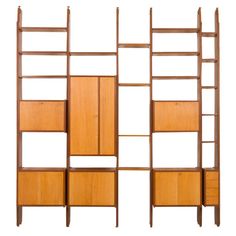 a bookcase with wooden shelves and doors on each side, against a white background