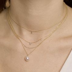 Elliptical Pearl Pendant Necklace – STONE AND STRAND Modern Necklace With Single Round-cut Diamond, Modern Necklace With Single Round Cut Diamond, Modern Single Diamond Round Cut Necklace, Modern Round Diamond Necklace, Everyday Elegance Pearl Pendant Jewelry, Everyday Elegant Pearl Pendant Jewelry, Modern Pearl Pendant Jewelry For Wedding, Refined Single Diamond Pendant Jewelry, Classic Akoya Pearl Diamond Necklace For Anniversary