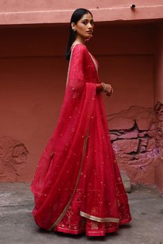 Vermillion lehenga with mix boota, floral embroidery. Paired with zari stripe blouse and dupatta.
Component: 3
Pattern: Embroidery
Type Of Work: Boota, floral
Neckline: Deep V neck
Sleeve Type: Half
Fabric: Silk, Organza
Color: Red
Other Details: 
Sheer dupatta
Back tassel tie-up
Occasion: Destination Wedding - Aza Fashions Red Floor-length Sharara With Zari Work, Transitional Chanderi Lehenga With Gota Work, Red Chanderi Lehenga With Resham Embroidery, Red Anarkali Sharara For Reception, Red Organza Sharara For Eid, Red Anarkali Lehenga In Raw Silk, Red Dola Silk Lehenga For Eid, Red Anarkali Sharara With Sheer Dupatta, Red Anarkali Style Sharara With Dupatta