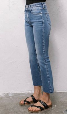 High waist, cropped denim in a light wash with a flared raw-edge hem Pair with booties or birks. Perfect for springtime bike rides or running errands! Runs slightly small- order one size up if between sizes Cropped Boyfriend Jeans, Kick Flare Jeans, Bike Rides, Kick Flares, Birkenstock Mayari, Cropped Denim, Newest Trends, Bike Ride, Sneak Peek