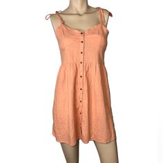 New With Tags! Aerie Peach Dress. Size Small. Button Detail Front (Buttons Don't Function) Tie Shoulder Straps. Small Discoloration On The Front (See Last Picture). Spring Beach Sundress With Buttons, Beach Cotton Mini Dress With Buttons, Casual Beach Mini Dress With Button Closure, Cotton Mini Dress With Buttons For Beach, Cotton Mini Dress With Button Closure For Vacation, Casual Mini Dress With Buttons For Vacation, Casual Mini Dress With Button Closure For Beach, Spring Vacation Sundress With Button Closure, Summer Mini Dress With Button Closure For Vacation