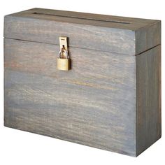 a wooden box with a lock on it