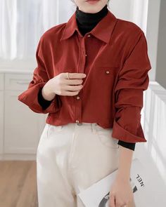 Long sleeve blouse with a relaxed boyfriend fit, gold buttons and suede corduroy texture to create a cozy vintage vibe. S: 17.5" across shoulders, 39" chest, 24" lengthM: 18" across shoulders, 40.5" chest, 24" lengthL: 18.5" across shoulders, 42" chest, 24.5" lengthXL: 19" across shoulders, 43.5" chest, 24.5" length Fall Shirt With Corduroy Collar And Long Sleeves, Long Sleeve Corduroy Tops With Buttons, Fall Corduroy Shirt With Buttons, Fall Top With Corduroy Collar, Fall Solid Top With Corduroy Collar, Solid Corduroy Tops With Button Closure, Fall Shirt With Solid Color And Buttoned Pockets, Corduroy Tops With Button Closure, Corduroy Long Sleeve Tops With Buttons