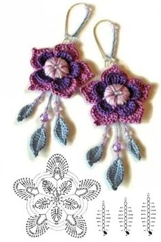 two crocheted earrings with flowers and leaves hanging from the hooks on each ear