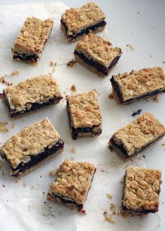 several squares of food sitting on top of a table