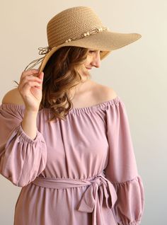 Block the rays in the most stylish of ways! Our BOHEMIAN hat comes in a natural tan woven texture. A straw beaded band tops off the look. Decorate your Summer outfits with a lightweight touch! Measurements: 4” Brim, 3.5” Crown Depth, 7.5” Head Diameter Material: 100% paper Chic Spring Boater Hat Made Of Paper Straw, Natural Panama Hat With Upf 50+ For Spring, Chic Braided Straw Sun Hat, Spring Brown Hats With Upf 50+, Spring Brown Hat With Upf 50+, Natural Straw Hat With Upf 50+ For Spring, Spring Braided Wide Brim Sun Hat, Beige Toquilla Straw Boater Hat For Day Out, Spring Straw Boater Hat For Day Out