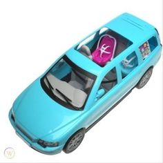 a blue toy car with the door open