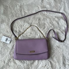 Very Cute And Dainty Color, Can Be Used As Crossbody Or Handbag, Includes Leather Crossbody Strap And Gold Chain As Handbag, Never Been Worn Purple Bag With Detachable Handle, Purple Bags With Detachable Handle, Purple Everyday Bag With Chain Strap, Purple Chain Strap Bag For Daily Use, Everyday Purple Shoulder Bag With Chain Strap, Purple Shoulder Bag With Chain Strap For Everyday, Purple Crossbody Bag For Evening, Elegant Purple Shoulder Bag With Detachable Strap, Purple Rectangular Bags With Chain Strap