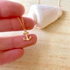 This dainty gold anchor necklace is 14k goldfilled and hypoallergenic.   Adjustable at 16" and 18" for versatility. Sweet layering piece for the summer. Dainty Charm Necklaces With Delicate Chain For Summer, Dainty Charm Necklace With Delicate Chain For Summer, Gold Charm Necklace For Summer Gifts, Anchor Necklace, Van Nuys, Layering Pieces, Pendant Necklaces, Jewelry Necklace Pendant, Layering