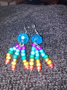 Adjustable Rainbow Earrings As Gift, Fun Adjustable Dangle Jewelry, Unique Rainbow Earrings, Adjustable Rainbow Sterling Silver Earrings, Unique Colorful Earrings With Ear Wire, Fun Nickel Free Drop Earrings, Unique Rainbow Drop Earrings, Colorful Artsy Dangle Earrings, Multicolor Dangle Plug Earrings With Matching Set