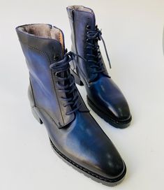 Buy TucciPolo Mens handmade Luxury Italian leather Winter Fur Navy Blue dress Boots. Handcrafted for the classy gentleman in mind. Get your pair today Leather : Italian calf skin leather with Fur Color: Navy Blue This is a made-to-order product. Each pair will be made upon receipt of order and shipped in approximately 15 days. Because our boots are hand-painted and couture-level creations, each shoe will have a unique hue and polish, and exactly as photo. * If you want this product in another co Blue Plain Toe Boots For Formal Occasions, Formal Blue Plain Toe Boots, Classic Blue Business Boots, Classic Blue Boots For Business, Elegant Blue Boots For Formal Occasions, Elegant Blue Formal Boots, Blue Goodyear Welted Boots With Round Toe, Formal Fitted Blue Boots, Designer Business Boots For Winter