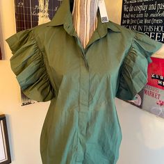 This Is Currently Still On The Website. $275 Retail. This Is Nwt - Gorgeous In Person. Size 12. Smoke Free Pet Friendly Home. Fall Short Sleeve Shirt With Ruffles, Fall Shirt With Ruffles And Short Sleeves, Spring Green Ruffled Shirt, Fall Ruffled Short Sleeve Shirt, Green Ruffled Top For Office, Collared Ruffle Tops For Office, Green Ruffled Tops For Daywear, Spring Office Tops With Ruffle Sleeves, Button-up Ruffled Tops For Brunch