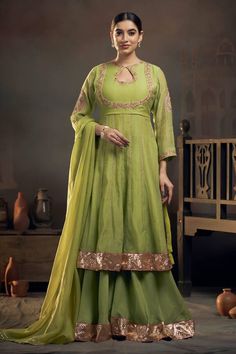 Green chanderi kalidar kurta with floral threadwork and sequins embroidery on neckline and sleeves. Comes with sharara and organza dupatta. - Aza Fashions Semi-stitched Pista Green Choli For Eid, Green Kundan Sharara For Eid, Pista Green Palazzo Set With Dabka Work In Georgette, Semi-stitched Kundan Sharara For Festive, Semi-stitched Sharara For Designer Wear Diwali, Pista Green Dola Silk Choli For Diwali, Pista Green Semi-stitched Choli For Eid, Pista Green Kundan Sets With Traditional Drape, Green Kundan Sharara For Diwali