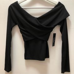 Lulus Long Sleeve Knit Off-The-Shoulder Wrap Top Size Small Black New With Tags Black Stretch Off-shoulder Knit Top, Trendy Black Off-shoulder Long Sleeve Top, Trendy Black Long Sleeve Off-shoulder Top, Black Off-shoulder Knit Top For Fall, Fitted Black Long Sleeve Off-shoulder Top, Fitted Black Off-shoulder Long Sleeve Top, Fitted Black Off-shoulder Top For Fall, Winter Black Off-shoulder Top, Elegant Black Long Sleeve Off-shoulder Top