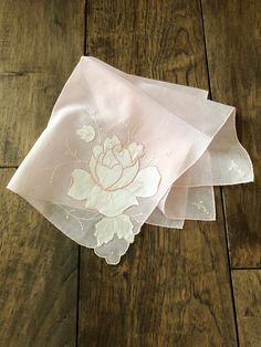 "This charming pale pink handkerchief has beautiful style with raised floral detail. It is in very good vintage condition. Nice larger size. Perfect as a personal accessory, for your celebration, crafts or hang it as it is that pretty. I use hankies as doilies too. Lovely... Approximate measurements: 15.5\" square Check out our other vintage hankies: https://www.etsy.com/shop/TwoBeContinued?ref=seller-platform-mcnav&section_id=24425115" Vintage Pink Handkerchiefs For Wedding, Vintage Pink Wedding Handkerchiefs, Vintage Handmade Handkerchiefs As Gifts, Vintage Cream Handkerchiefs As Gift, Vintage Cream Handkerchiefs Gift, Vintage Cream Handkerchief As Gift, Handmade Vintage Handkerchiefs As Gift, Vintage Handmade Wedding Handkerchiefs, Pink Handkerchief