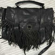 Black Fringe Leather. This Bag Was Kept In A Dust Bag And Has Little Signs Of Wear. It’s Such A Unique Style Of The Bag And Not One You See L. Designer Black Saddle Shoulder Bag, Designer Black Flap Bag With Adjustable Strap, Black Flap Satchel Bag With Dust Bag, Black Satchel Flap Bag With Dust Bag, Luxury Black Flap Saddle Bag, Trendy Shoulder Bag With Palladium Hardware, Trendy Travel Bag With Palladium Hardware, Luxury Bag With Gunmetal Hardware And Flap, Designer Black Saddle Bag With Removable Pouch