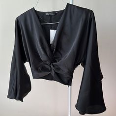 This Blouse Is Black, Beautiful And Soft Material. Size Xs Trendy V-neck Crop Top For Evening, Chic Evening Crop Top With V-neck, Chic Evening V-neck Crop Top, Chic Black V-neck Crop Top, Elegant Crop Top For Brunch In Fall, Elegant Fall Crop Top For Brunch, Elegant Crop Top For Fall Brunch, Fall Evening V-neck Crop Top, Elegant V-neck Crop Top For Day Out