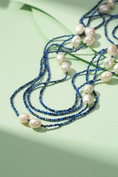 The blue lapis beaded long necklace, 180cm in length, features freshwater baroque pearls of AAA class quality. This stunning piece combines deep blue lapis beads with lustrous pearls, creating a unique and elegant design perfect for layering or wearing solo. Product Details: Material: freshwater baroque pearls, blue lapis. Necklace Length: 180cm/70 inches Design: blue lapis with baroque pearls Style: Elegant, Refined Occasion: Ideal for elegant daily wear or enhancing special occasion attire Pro Baroque Pearls Necklace, Lapis Necklace, Golden South Sea Pearls, Mabe Pearl, Pearl Jewelry Necklace, Baroque Pearl Necklace, Purple Pearl, Pearl Necklaces, Blue Lapis