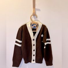 Vintage 70s Boys Cardigan Size 7 Nwt Amazing Brown And Cream Color! Button Front Classic/Academia Aesthetic Classic Brown Cotton Cardigan, Brown Cotton Sweater With Button Closure, Brown Cotton Cardigan With Button Closure, Brown Button-up Cotton Cardigan, Brown Cotton Cardigan With Buttons, Winter Brown Outerwear For School, Brown Button-up Cotton Sweater, Brown Cotton Button-up Sweater, Retro White Sweater With Buttons