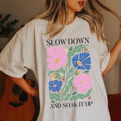 Show off your flower-child boho aesthetic in this vintage style Comfort Colors t-shirt. Soon to be your new favorite shirt. Exclusively designed by Parcel 23. Produced and delivered in about a week. Select your size and your favorite color option. Please double check your shipping address at checkout. About the shirt: 100% garment dyed, sustainably sourced cotton Comfort Colors Tee Relaxed, Unisex Fit Size up a size or two for an over-sized, aesthetic fit. Direct to garment printed, not a transfer. This is Etsy, of course we can customize it! Give me a shout if there is any way I tweak this design to make you love it even more. Anything else I can do for you? Please contact me via Etsy Messages, I'm happy to help. Big thanks for shopping small! Parcel23.etsy.com Multicolor Bohemian Relaxed Fit T-shirt, Oversized Bohemian Cotton T-shirt, Bohemian Oversized Cotton T-shirt, Hippie Tops With Funny Print For Spring, Hippie Letter Print Tops For Spring, Hippie Top With Funny Print For Spring, Spring Hippie Top With Funny Print, Bohemian Pink Graphic Print T-shirt, Bohemian Multicolor Relaxed Fit T-shirt