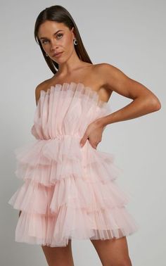 Allora Tiered Tulle Fit and Flare Mini Dress in Pale Pink | Showpo USA Flirty Mini Length Bridesmaid Dress, Flirty Mini Bridesmaid Dress, Chic Strapless Tulle Dress With Sweetheart Neckline, Strapless Tulle Party Dress, Chic Fitted Strapless Tulle Dress, Chic Fitted Strapless Dress With Tulle Skirt, Strapless Tulle Mini Dress For Spring, Pink Strapless Ruffled Dress, Spring Tulle Dress With Sweetheart Neckline