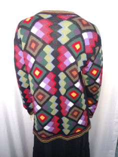 "VTG WOMEN MULTICOLOR CARDIGAN KNIT BLAZER SOFT WINTER CARDIGAN. Colorful cardigan with unique special designed buttons. Very soft lightweight button up sweater. Can be worn all year around. *Size: L *Acrylic *Perfect Condition Measurement: ( Please check the numbers ) *Shoulder: 20\" ( Lowered sleeve ) *Bust: 20\" *Hip: 21\" *Length: 34\" *Sleeve: 18\" Thank you for visiting my store. You can also visit my \" MargaretJewelryShop \"" Cardigan Colorful, Multicolor Cardigan, Colorful Cardigan, Cardigan Blazer, Multicolor Knit, Multicolor Sweater, Soft Winter, Colored Cardigans, Denim Overall Dress