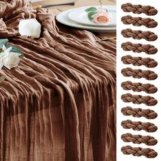 the table is set with chocolate colored cookies and flowers on it, along with two white plates