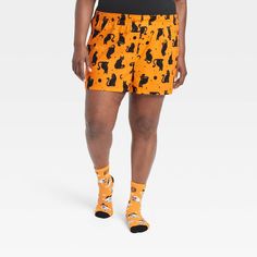 Get yourself ready for the fall season with the Cat Print Halloween Matching Family Boxer Pajama Shorts from Hyde & EEK! Boutique™. These orange shorts are covered with a print of black cats for an eye-catching look, making it perfect for Halloween fun. Tailored from 100% cotton fabric in a regular-fit cut, these lightweight boxer pajama shorts help provide soft and breathable comfort and are fun to pair with your favorite loungewear. Plus, their full elastic waistband helps keep them in place. Womens Boxer, Lazy Halloween, Halloween Matching, Black Cat Print, Matching Family Pajamas, Orange Shorts, Family Costumes, Fleece Shorts, Orange Background