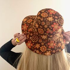 This is the Groovy Retro Floral wide brim sun hat. Handmade from an exclusive Stan&Gwyn print. These hats are reversible with a choice of yellow or brown for the reverse side. The hat features self colour top stitching and a Stan&Gwyn label on the brim. It's always best if you provide me with your exact head measurement for an accurate fit.  Otherwise please choose from the following sizes - Small - 22" Med - 23" Large - 24" XL - 25" These hats are very lightweight so easy to pack for your summe Retro Wide Brim Sun Hat For Summer, Retro Brimmed Sun Hat For Summer, Retro Brimmed Sun Hat For Vacation, Retro Summer Hat With Curved Brim, Retro Wide Brim Summer Hat, Retro Summer Sun Hat, Retro Multicolor Bucket Sun Hat, Retro Summer Festival Hats, Retro Brimmed Bucket Hat For Beach