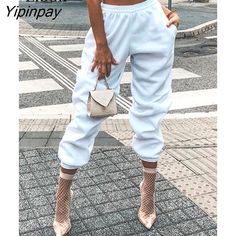 Shipping: Worldwide Express Shipping AvailableDelivery time: 🚚7-15Days Fast ShippingReturns: Fast refund,💯100% Money Back Guarantee.Brand Name: LiooilStyle: StreetwearOrigin: Mainland ChinaCN: GuangdongWaist Type: HIGHDecoration: PocketsFabric Type: BroadclothPattern Type: SolidPant Style: Cargo PantsMaterial: CottonMaterial: PolyesterMaterial: SpandexFit Type: LOOSELength: Full LengthClosure Type: Elastic WaistGender: WOMENModel Number: AZhan0118Front Style: Flat Trendy Baggy Solid Color Pants, Trendy Baggy Pants In Solid Color, Trendy Baggy Harem Pants, Trendy Solid Color Streetwear Bottoms, Trendy Summer Harem Pants With Pockets, Trendy Streetwear Bottoms Solid Color, High Waist Solid Color Bottoms For Streetwear, Trendy Streetwear Bottoms In Solid Color, Trendy Baggy High Waist Harem Pants