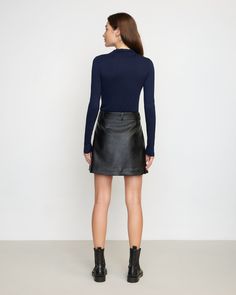 A mini skirt with a subtle edge in a soft vegan leather adds effortless polish to any wardrobe. Pair with everything from a black blouse in warmer weather to a chunky knit for a cozy look. See below for our general Size Guide and available measurements Self made of 100% polyurethane, lining made of 100% polyester Machine wash cold and lay flat to dry Leather Wrap Skirt, Self Made, Leather Wraps, Wrap Skirt, Black Blouse, Chunky Knit, Lay Flat, Size Guide, Vegan Leather