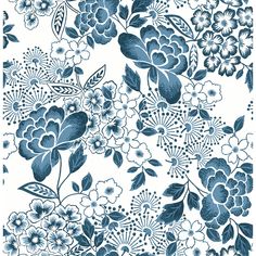 a blue and white floral wallpaper with lots of flowers on the bottom half of it