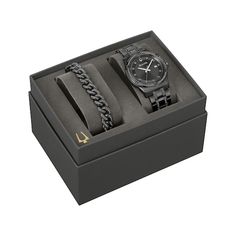 He'll exude confidence with this smart watch and bracelet gift set from the Bulova Crystal collection. 42mm black ion-plated stainless steel case with black sunray dial Full black crystal bezel and 11 black crystal markers, date display and flat mineral crystal Black crystals on the black ion-plated stainless steel bracelet complement the case and dial Fold-over safety clasp The black ion-plated stainless steel Cuban curb chain bracelet shines with 260 pavé-set black crystals Boxed and ready to Modern Black Jewelry And Watches As Gifts, Black Round Dial Jewelry And Watches For Gift, Black Jewelry And Watches With Round Dial For Gift, Mens Wedding Rings Gold, Exclusive Engagement Rings, Kays Engagement Ring, Gold Layered Bracelets, Neil Lane Engagement Rings, Pearl Jewelry Shop