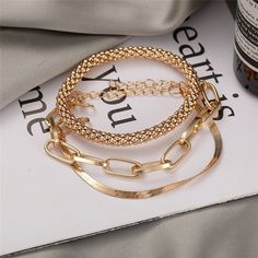 FREE SHIPPING ON ALL ORDERS OVER $50 | 100% SATISFACTION GUARANTEED Click "ADD TO CART" To Get Yours Now | Up To 60% OFF ✨ Made for the modern woman, this set of 3 stackable fashion bangles from Arimonz is crafted with solid materials & features a thick chain link design. A convenient hinged design allows for easy on & off while the brushed finish provides an understated look that will complement any style. Features: 📌 Trendy and Fashionable 📌 Made of Zinc Alloy 📌 Comes with Thick Material 📌 Color Bracelets, Stackable Bangles, Gold Bracelet Set, Bangles For Women, Heavy Chain, Snake Chain Bracelets, Punk Jewelry, Stylish Bracelet, Silver Chain Bracelet