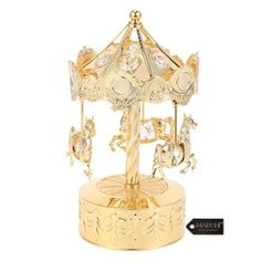 a golden carousel with lots of jewels on it