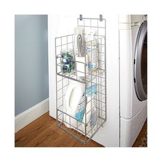 a white dryer sitting next to a drying machine