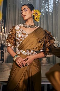 Brown pre-draped ruffled saree. Paired with a floral embroidered ruffled sleeve blouse and embroidered belt. - Aza Fashions Ruffled Saree, Saree Gowns, Dhoti Saree, Cotton Sarees Handloom, Ruffle Saree, Embroidered Belt, Drape Saree, Lehenga Saree, Blouse For Women