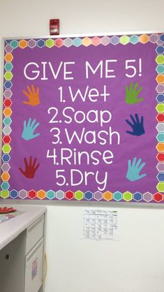 a purple sign that says give me five, 1 wet 2 soap 3 wash 4 rinse 5 dry