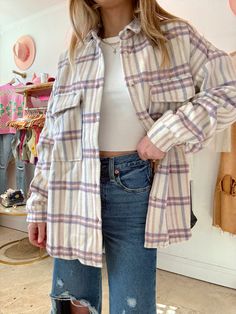 Our Lavender Latte Plaid Shacket is the cutest shacket to add to your collection! This shacket features lavender, mauve and cream plaid pattern, two front pockets, and a slit hem. Style this shacket with all your favorite jeans for the cutest outfits! Content: 100% Polyester Fit: TTS Model wearing size: Small Model sizing: 0-2 top, 24" bottoms | Height: 5'3" Lavender Latte, Shacket Outfit, Cutest Outfits, Plaid Shacket, Choose Happy, Hem Style, Store Fronts, Free Spirit, Favorite Jeans