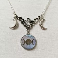 Brand New Triple Moon Cabochon And Crescent And Full Moons Silver Necklace. New To Poshmark? Use Referral Code Kimberlyn222 To Receive $10. Small Necklaces, Moon Goddess Necklace, Triple Moon Goddess, Goddess Necklace, Small Necklace, Triple Moon, Cross Chain, Moon Goddess, Moon Necklace