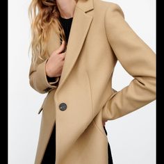 Coat Made Of Manteca High Quality Italian Wool Blend Fabric. Lapel Collar And Long Sleeves With Shoulder Pads. Flap Pockets At Front. Back Vent. Interior Lining. Front Button Closure. Best Seller Coat! Sold Out At Zara! Tailored Beige Winter Outerwear, Beige Pea Coat With Notch Lapel For Work, Beige Winter Blazer With Double Button Closure, Winter Beige Blazer With Double Button Closure, Elegant Beige Pea Coat With Pockets, Zara Brown Business Outerwear, Zara Brown Outerwear For Business, Beige Wool Coat For Work, Beige Single Breasted Wool Coat For Office