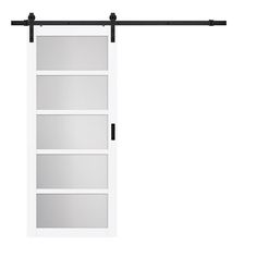 a white sliding door with black hardware on the top and bottom bars, in front of a