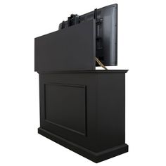 a black podium with a flat screen tv on top