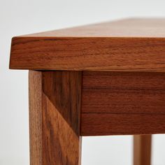 a close up view of the top of a wooden table