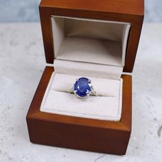 Genuine Blue Sapphire Ring DESCRIPTION A beautifully faceted, sparkling Blue Sapphire gemstone with stunning flash. Delicately set in a high profile prong setting-- so that light comes in from every angle to showcase every angle and color. Magnificent and one-of-a-kind. * Please allow 7-10 days processing time for Sterling Silver Option of this ring. Please allow 2-3 weeks processing time for 14k Gold Option as your ring will be specially made for you. GEMSTONE DETAILS * Genuine Madagascar Blue Oval Faceted Sapphire Ring Fine Jewelry, Oval Tanzanite Diamond Ring For Gift, Oval Tanzanite Diamond Ring As A Gift, Ring Saphir, Gemstone Solitaire Ring, Saphir Ring, Blue Engagement Ring, Special Occasion Jewelry, Ring Sapphire