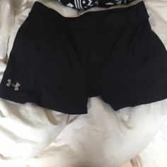 Never Worn. 85% Nylon And 15% Elastic Black Nylon Shorts With Short Legs, Black Nylon Short Bottoms, Black Nylon Short Leg Bottoms, Black Nylon Bottoms With Short Legs, Casual Black Compression Shorts, Black Nylon Shorts, Under Armour Black Workout Bottoms, Under Armour Stretch Gym Shorts, Under Armour Black Shorts With Elastic Waistband