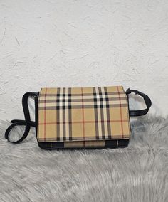 Burberry Hampshire Tartan mix. Features a check/tartan mix exterior and leather lined interior. Adjustable crossbody strap and silver hardware. Please view pictures and read descriptions before purchasing. 14cm x 20cm x 4cm Exterior and Interior are good. Edges and corners are good. Strap is good and interior is good. Cutw and structured piece. No dust bag, no damage and no added accessories Tartan Design, View Pictures, Crossbody Strap, Silver Hardware, Hampshire, Cross Body Handbags, Purses And Handbags, Tartan, 20 Cm