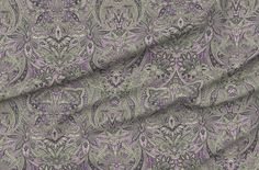 an image of a blue and green paisley pattern on a white background with measurements for the fabric