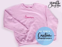 "This listing is for 1 personalized embroidered toddler sweatshirt. This custom is the perfect gift for the child in your life. Add up to 2 words or names to the sweatshirt. With 40 options for thread color and 5 beautiful sweatshirt shades. Get your child's name monogrammed on this super comfy fleece pullover, all customized to them! HOW TO ORDER: -Choose sweatshirt color and size (Please use our measurements for more precise sizing) -Choose between our 12 options of embroidered fonts available Pink Long Sleeve Hoodie With Embroidered Text, Pink Long Sleeve Hoodie With Custom Embroidery, Pink Crew Sweatshirt With Embroidered Graphics, Pink Long Sleeve Sweatshirt With Custom Embroidery, Pink Long Sleeve Sweatshirt With Embroidered Text, Pink Crew Sweatshirt With Embroidered Logo, Relaxed Fit Pink Sweatshirt With Embroidered Graphics, Pink Long Sleeve Sweatshirt With Embroidered Logo, Long Sleeve Pink Sweater With Embroidered Text