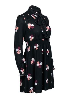 Instantly upgrade your wardrobe with this moody floral dress from Kate Spade. This dress has a feminine edge with the tie neck detail and smock waist that hugs your waist. Pair this with a heeled bootie and add some edge by adding a leather jacket! Size XXS Shell 100% Polyester Lining 100% Polyester Lined Skirt Pullover Smock stretch waist Neck tie detail Polka dot print back yoke Smocked wrist long sleeve Faux button front V-neckline Bust 30.75" Waist 23.75" Shoulder to hem 33" Sleeve length 23 Chic Floral Print Tie Neck Dress, Feminine Black Dress For Work, Chic Tie Neck Dress For Fall, Black Feminine Dress For Fall, Feminine Black Floral Print Midi Dress, Chic Black Floral Dress For Fall, Black Floral Print Dress For Fall, Black Floral Print Dress For Work, Fall Tie-neck Dress For Work